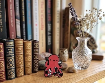 Red Octopus Reading Book Pin